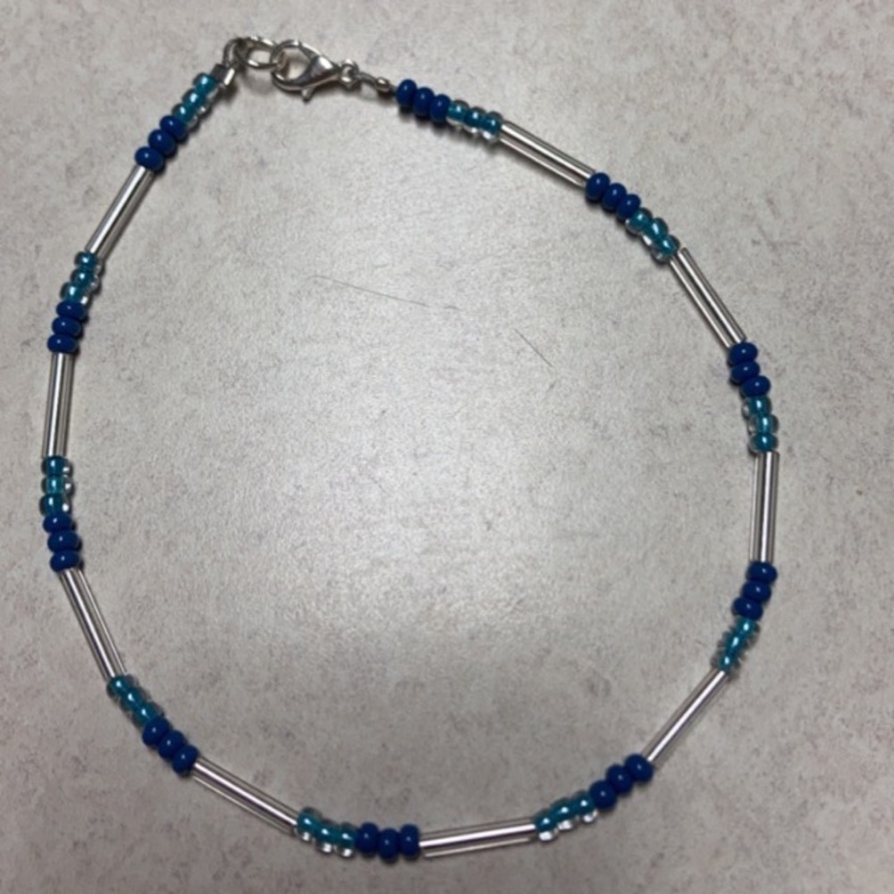 Multiple handmade ankle bracelets